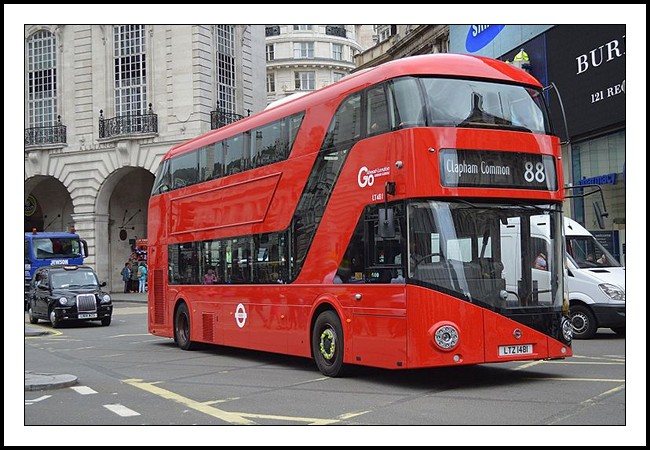 A photograph of a modern style Routemaster bus in central London operating the 88 bus route.