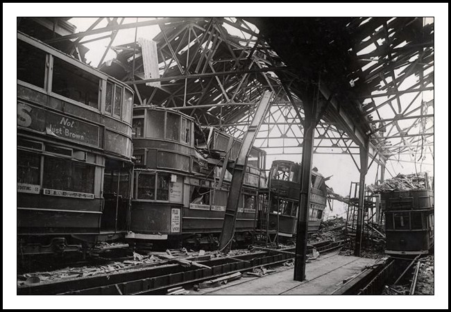A photograph taken during the second world war of a bomb damaged Clapham Tram Depot.
